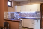 It is a kitchen of high standard regarding its equipment as well as its look